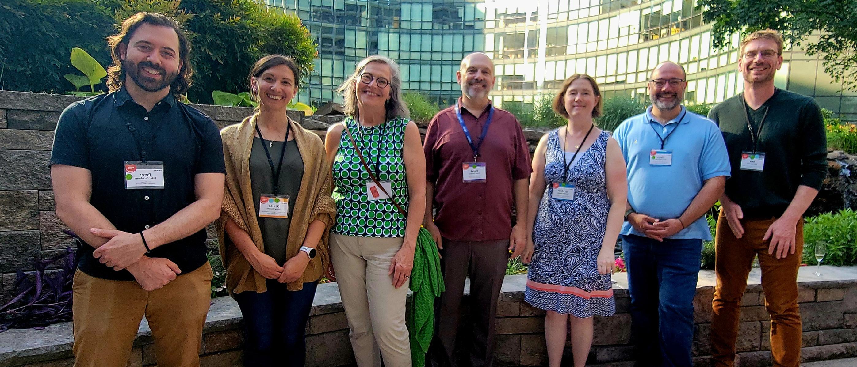 A group of UNE researchers poses outside at a conference in Washington, D.C.