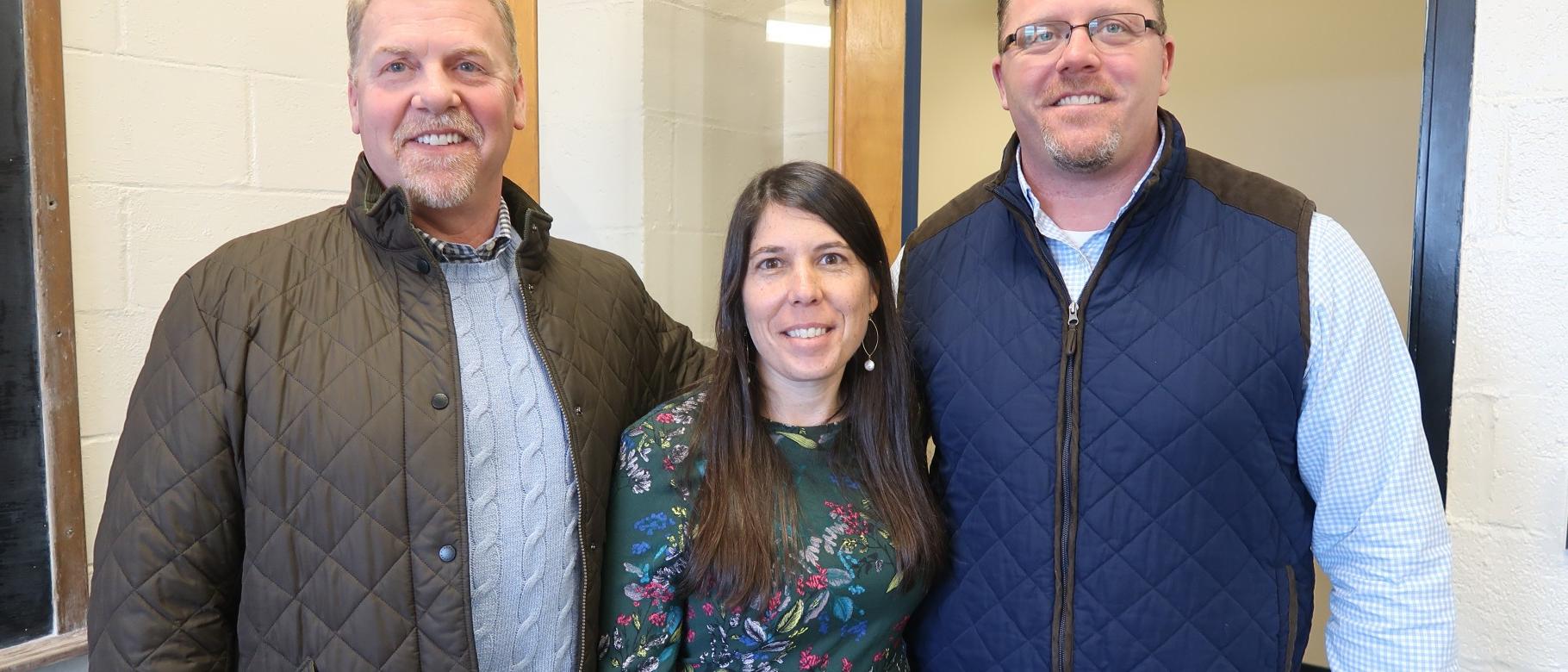 Former members of the Portland Pirates' management team Brad Church and Ron Cain with Aimee Vlachos